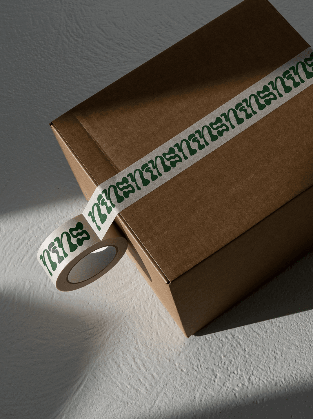 Mockup of a Box with a Branded tape